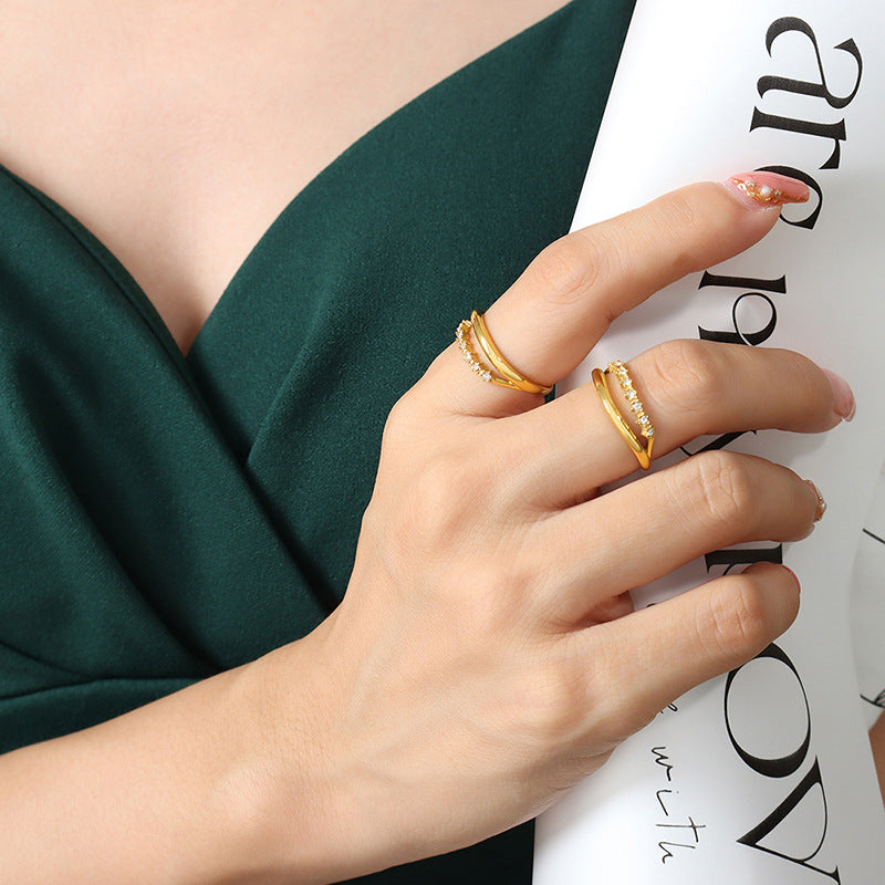 Titanium steel 18K gold plated geometric stripe ring on hand, Close-up of horizontal striped design on gold plated ring, Luxury gift box with 18K gold titanium steel jewelry, Water-resistant gold plated ring with recycled titanium steel,Two-year guarantee hypoallergenic gold tone ring
