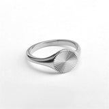 Titanium steel 18K gold plated geometric stripe ring on hand, Close-up of horizontal striped design on gold plated ring, Luxury gift box with 18K gold titanium steel jewelry, Water-resistant gold plated ring with recycled titanium steel,Two-year guarantee hypoallergenic gold tone ring