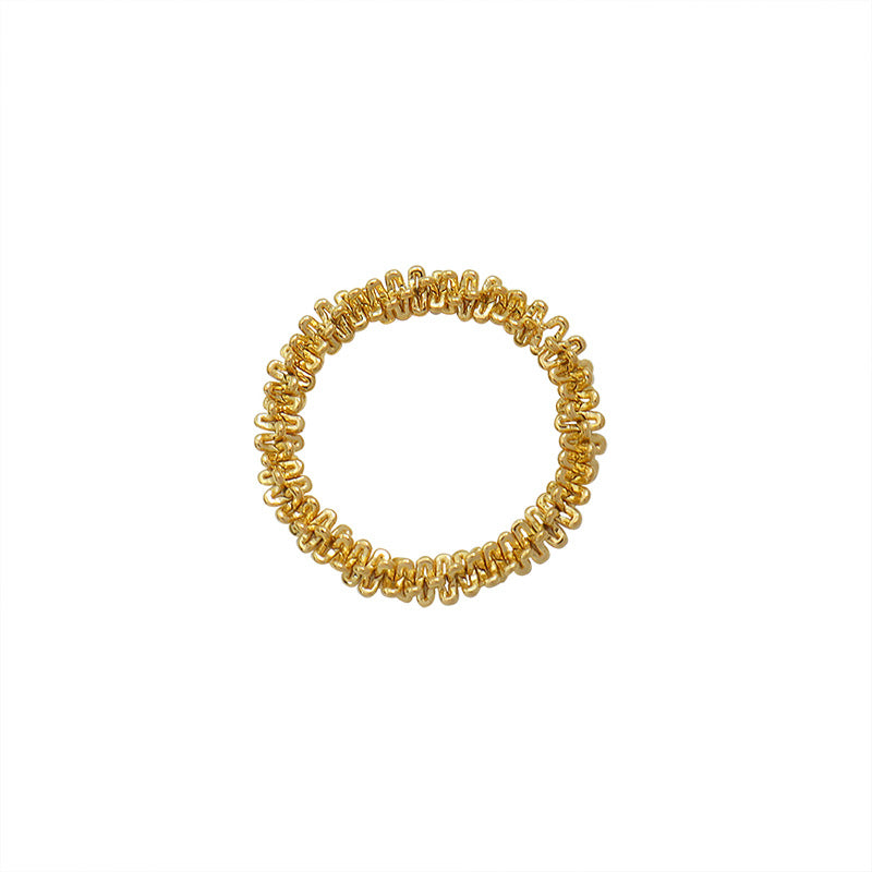 Titanium steel 18K gold plated geometric stripe ring on hand, Close-up of horizontal striped design on gold plated ring, Luxury gift box with 18K gold titanium steel jewelry, Water-resistant gold plated ring with recycled titanium steel,Two-year guarantee hypoallergenic gold tone ring