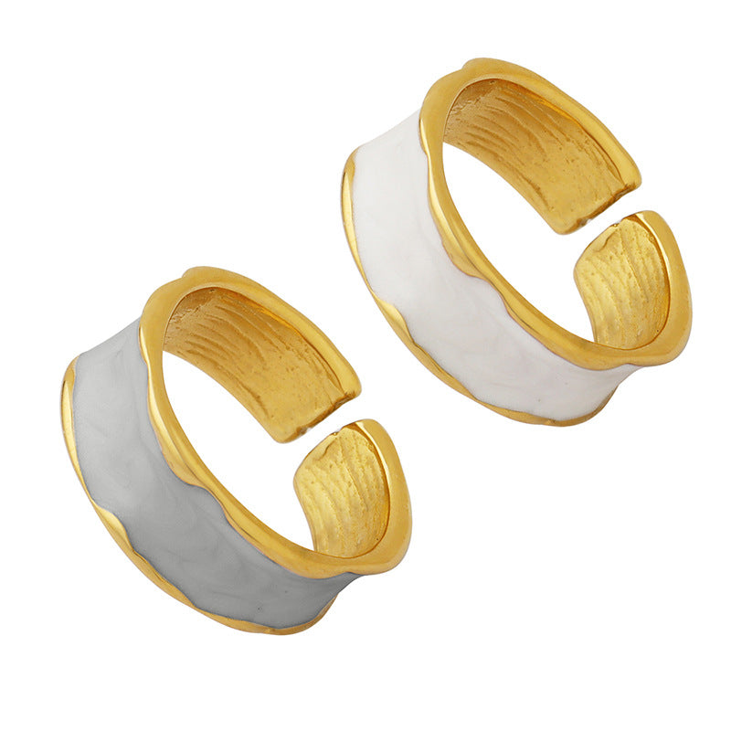 Titanium steel 18K gold plated geometric stripe ring on hand, Close-up of horizontal striped design on gold plated ring, Luxury gift box with 18K gold titanium steel jewelry, Water-resistant gold plated ring with recycled titanium steel,Two-year guarantee hypoallergenic gold tone ring