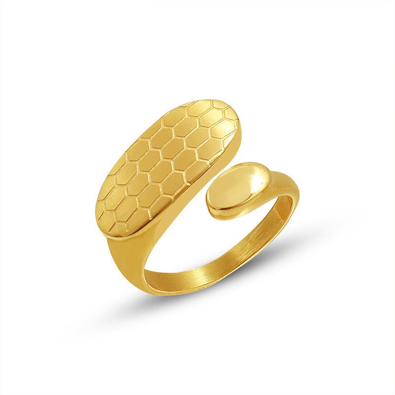 Titanium steel 18K gold plated geometric stripe ring on hand, Close-up of horizontal striped design on gold plated ring, Luxury gift box with 18K gold titanium steel jewelry, Water-resistant gold plated ring with recycled titanium steel,Two-year guarantee hypoallergenic gold tone ring