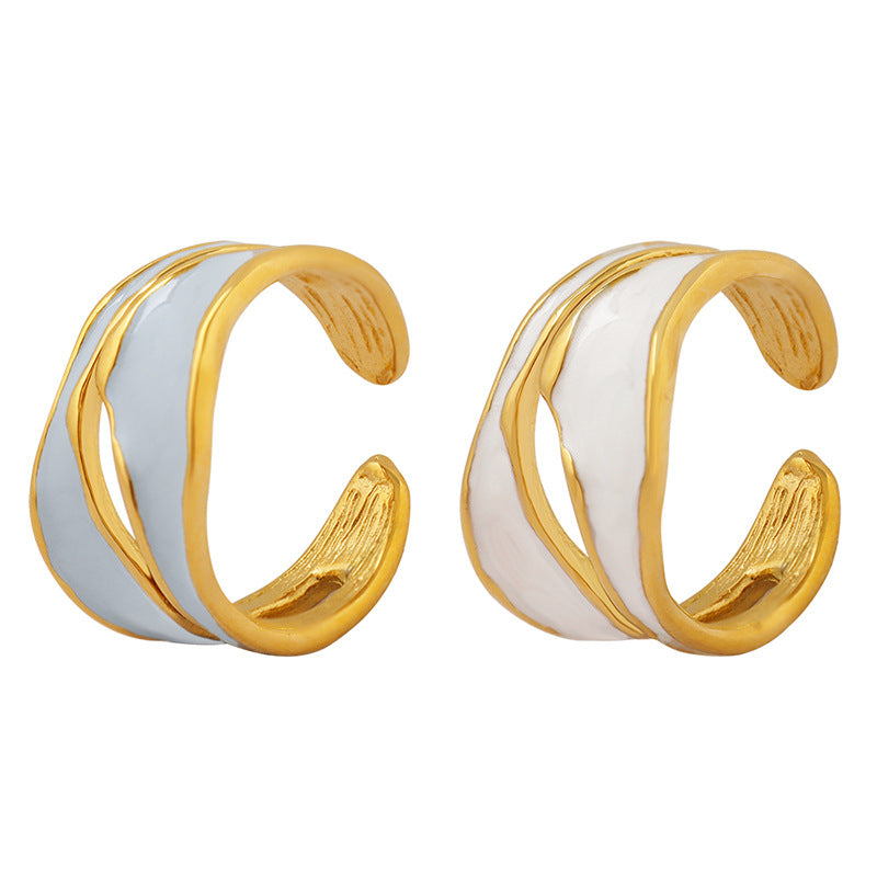 Titanium steel 18K gold plated geometric stripe ring on hand, Close-up of horizontal striped design on gold plated ring, Luxury gift box with 18K gold titanium steel jewelry, Water-resistant gold plated ring with recycled titanium steel,Two-year guarantee hypoallergenic gold tone ring