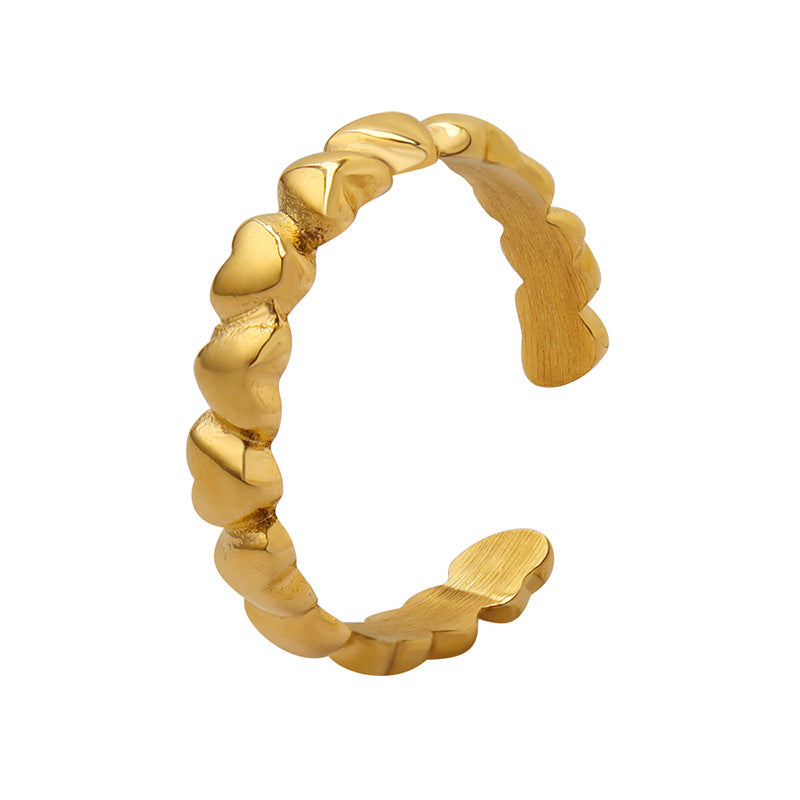 Titanium steel 18K gold plated geometric stripe ring on hand, Close-up of horizontal striped design on gold plated ring, Luxury gift box with 18K gold titanium steel jewelry, Water-resistant gold plated ring with recycled titanium steel,Two-year guarantee hypoallergenic gold tone ring