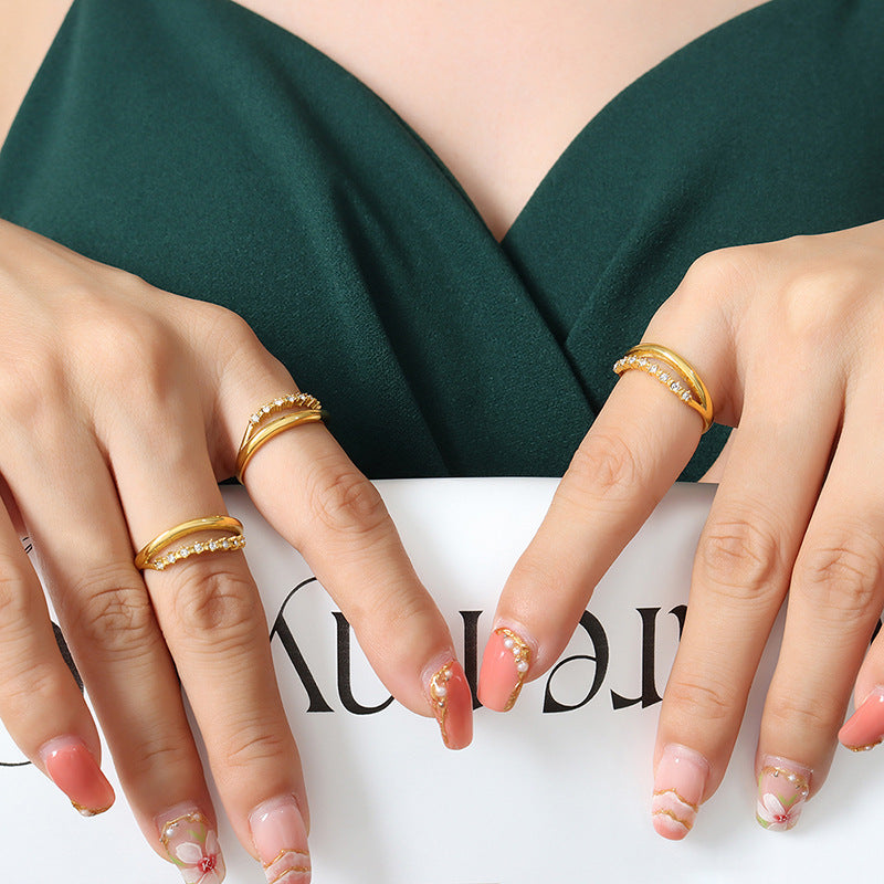 Titanium steel 18K gold plated geometric stripe ring on hand, Close-up of horizontal striped design on gold plated ring, Luxury gift box with 18K gold titanium steel jewelry, Water-resistant gold plated ring with recycled titanium steel,Two-year guarantee hypoallergenic gold tone ring