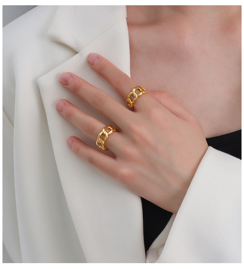 Titanium steel 18K gold plated geometric stripe ring on hand, Close-up of horizontal striped design on gold plated ring, Luxury gift box with 18K gold titanium steel jewelry, Water-resistant gold plated ring with recycled titanium steel,Two-year guarantee hypoallergenic gold tone ring