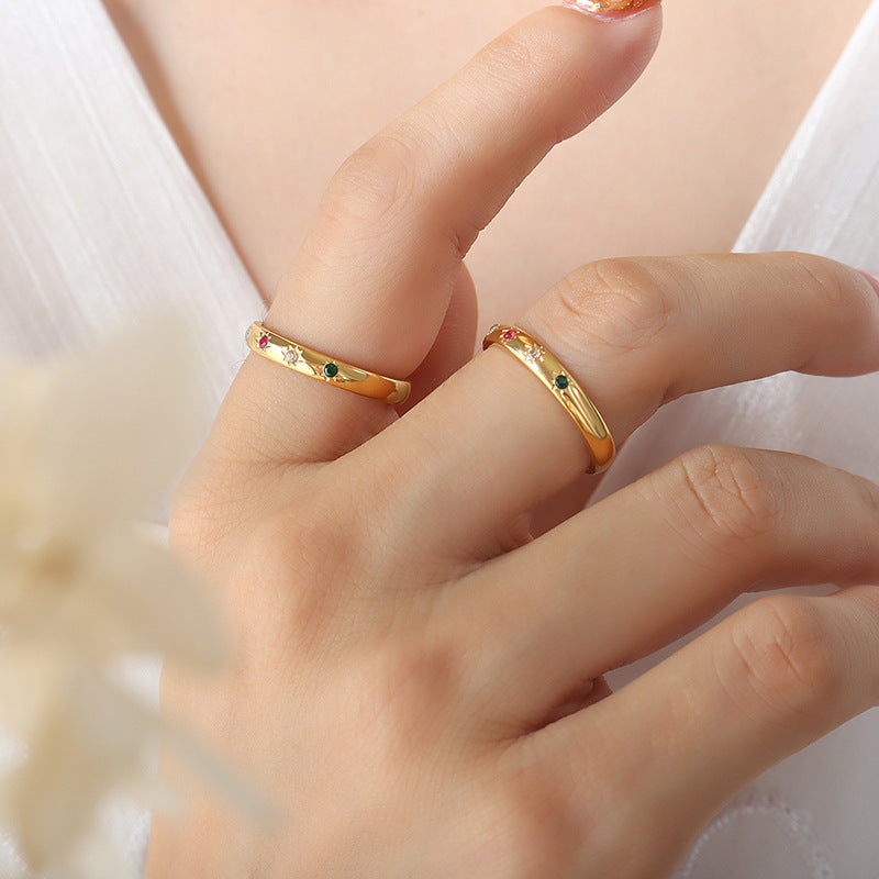 Titanium steel 18K gold plated geometric stripe ring on hand, Close-up of horizontal striped design on gold plated ring, Luxury gift box with 18K gold titanium steel jewelry, Water-resistant gold plated ring with recycled titanium steel,Two-year guarantee hypoallergenic gold tone ring