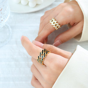 Titanium steel 18K gold plated geometric stripe ring on hand, Close-up of horizontal striped design on gold plated ring, Luxury gift box with 18K gold titanium steel jewelry, Water-resistant gold plated ring with recycled titanium steel,Two-year guarantee hypoallergenic gold tone ring
