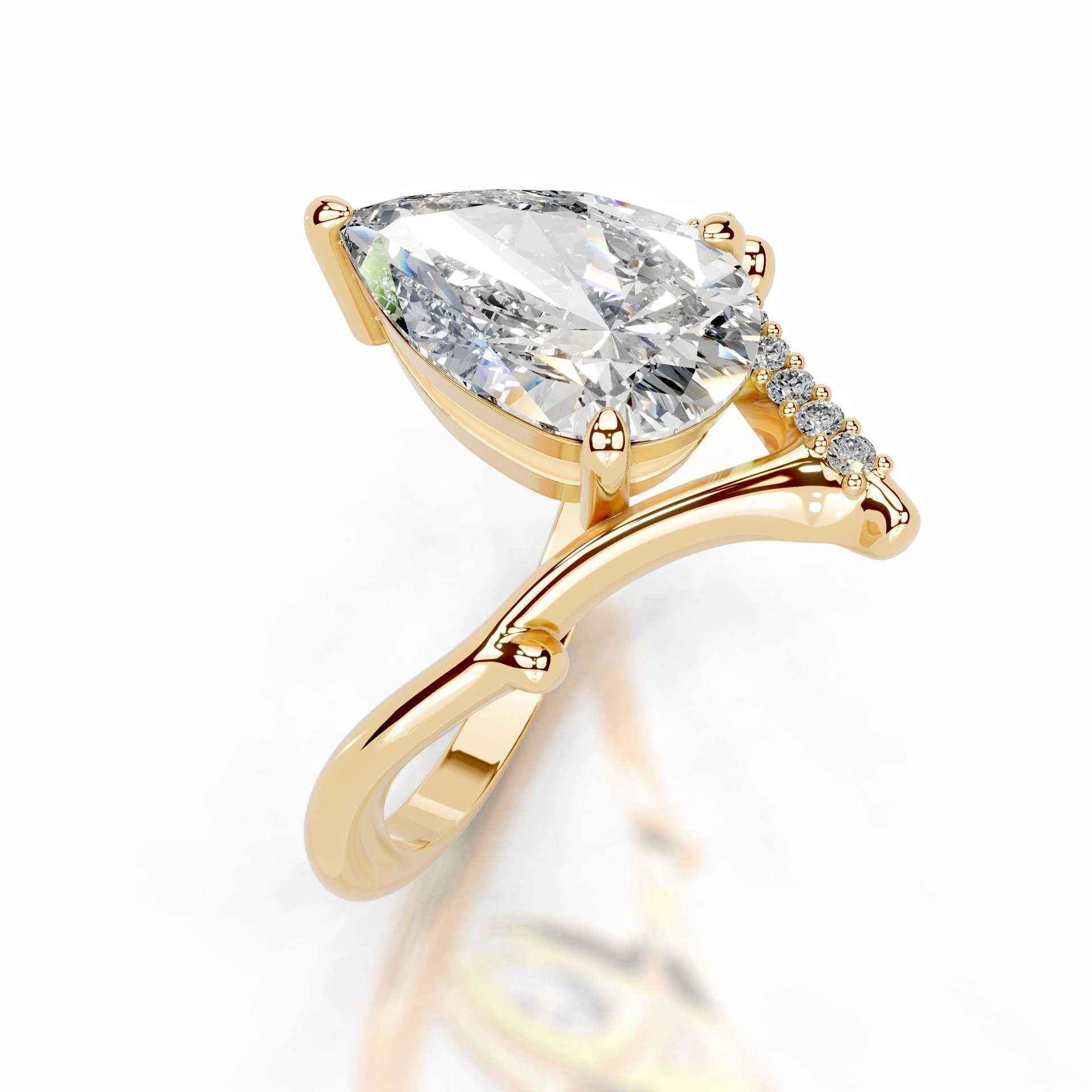 Pear Ribbon Moissanite Solitaire Ring