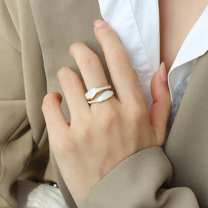 Titanium steel 18K gold plated geometric stripe ring on hand, Close-up of horizontal striped design on gold plated ring, Luxury gift box with 18K gold titanium steel jewelry, Water-resistant gold plated ring with recycled titanium steel,Two-year guarantee hypoallergenic gold tone ring