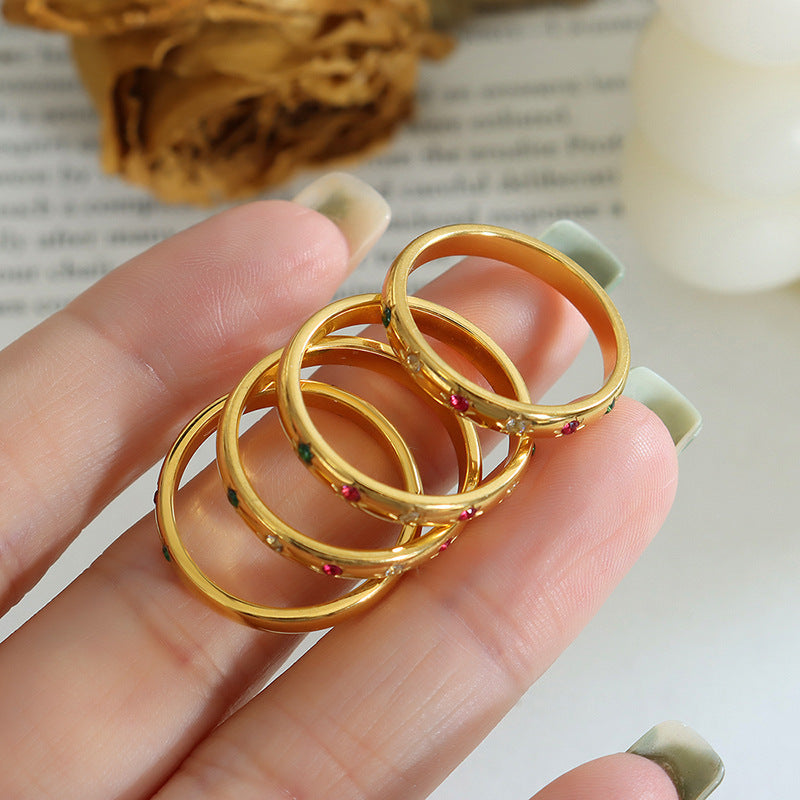 Titanium steel 18K gold plated geometric stripe ring on hand, Close-up of horizontal striped design on gold plated ring, Luxury gift box with 18K gold titanium steel jewelry, Water-resistant gold plated ring with recycled titanium steel,Two-year guarantee hypoallergenic gold tone ring