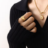 Titanium steel 18K gold plated geometric stripe ring on hand, Close-up of horizontal striped design on gold plated ring, Luxury gift box with 18K gold titanium steel jewelry, Water-resistant gold plated ring with recycled titanium steel,Two-year guarantee hypoallergenic gold tone ring