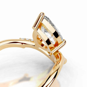 Pear Ribbon Moissanite Solitaire Ring