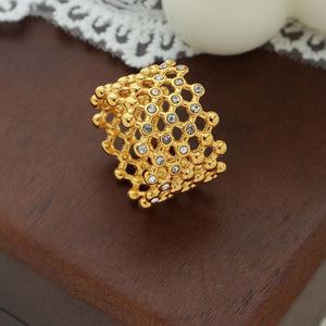 Titanium steel 18K gold plated geometric stripe ring on hand, Close-up of horizontal striped design on gold plated ring, Luxury gift box with 18K gold titanium steel jewelry, Water-resistant gold plated ring with recycled titanium steel,Two-year guarantee hypoallergenic gold tone ring