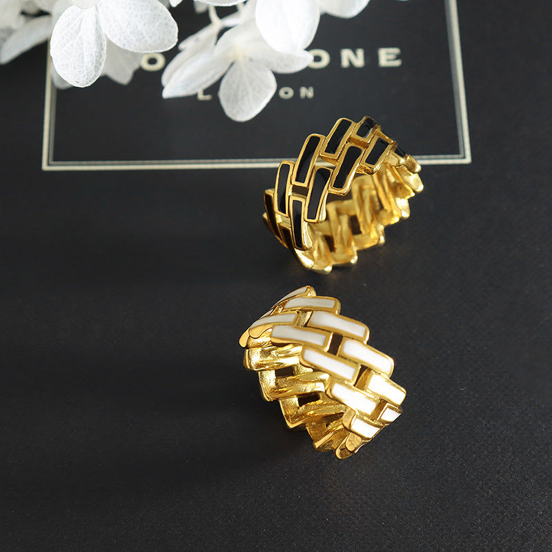 Titanium steel 18K gold plated geometric stripe ring on hand, Close-up of horizontal striped design on gold plated ring, Luxury gift box with 18K gold titanium steel jewelry, Water-resistant gold plated ring with recycled titanium steel,Two-year guarantee hypoallergenic gold tone ring