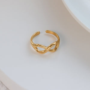 Titanium steel 18K gold plated geometric stripe ring on hand, Close-up of horizontal striped design on gold plated ring, Luxury gift box with 18K gold titanium steel jewelry, Water-resistant gold plated ring with recycled titanium steel,Two-year guarantee hypoallergenic gold tone ring