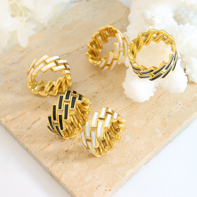 Titanium steel 18K gold plated geometric stripe ring on hand, Close-up of horizontal striped design on gold plated ring, Luxury gift box with 18K gold titanium steel jewelry, Water-resistant gold plated ring with recycled titanium steel,Two-year guarantee hypoallergenic gold tone ring