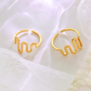 Titanium steel 18K gold plated geometric stripe ring on hand, Close-up of horizontal striped design on gold plated ring, Luxury gift box with 18K gold titanium steel jewelry, Water-resistant gold plated ring with recycled titanium steel,Two-year guarantee hypoallergenic gold tone ring