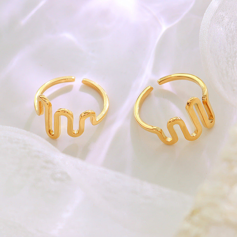Titanium steel 18K gold plated geometric stripe ring on hand, Close-up of horizontal striped design on gold plated ring, Luxury gift box with 18K gold titanium steel jewelry, Water-resistant gold plated ring with recycled titanium steel,Two-year guarantee hypoallergenic gold tone ring