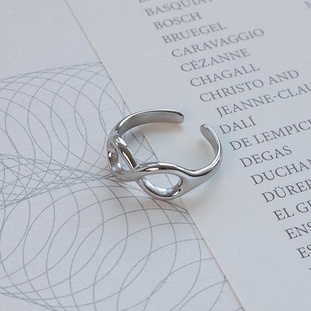 Titanium steel 18K gold plated geometric stripe ring on hand, Close-up of horizontal striped design on gold plated ring, Luxury gift box with 18K gold titanium steel jewelry, Water-resistant gold plated ring with recycled titanium steel,Two-year guarantee hypoallergenic gold tone ring