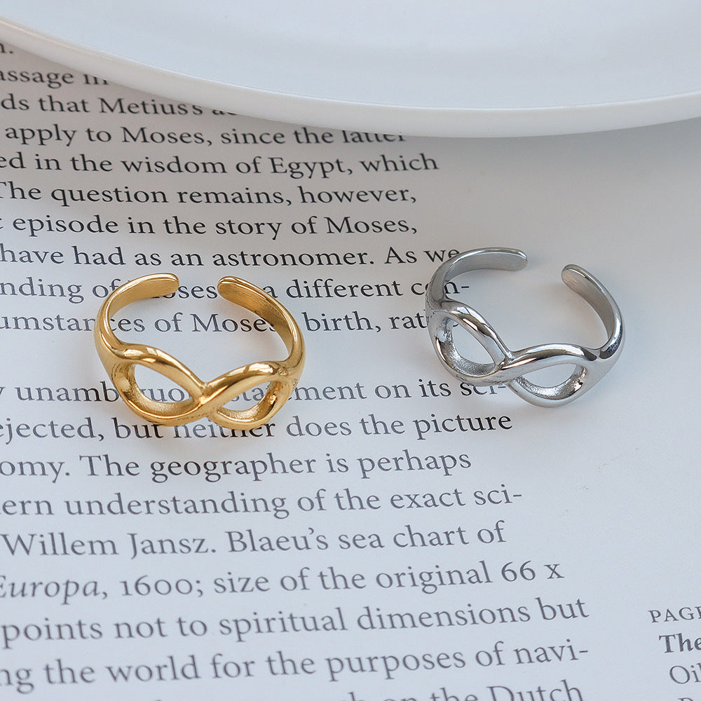 Titanium steel 18K gold plated geometric stripe ring on hand, Close-up of horizontal striped design on gold plated ring, Luxury gift box with 18K gold titanium steel jewelry, Water-resistant gold plated ring with recycled titanium steel,Two-year guarantee hypoallergenic gold tone ring