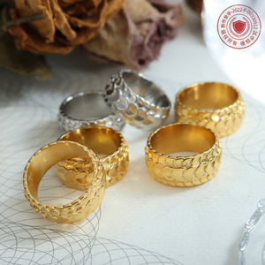 Titanium steel 18K gold plated geometric stripe ring on hand, Close-up of horizontal striped design on gold plated ring, Luxury gift box with 18K gold titanium steel jewelry, Water-resistant gold plated ring with recycled titanium steel,Two-year guarantee hypoallergenic gold tone ring