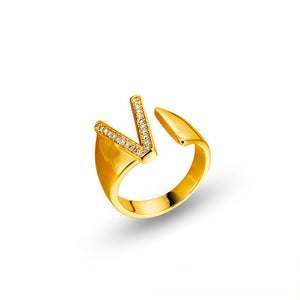 Adjustable brass letter A ring with micro-paved zirconia stones close-up, Top view of 18K gold-plated brass alphabet ring set spread on velvet, Side view of brass letter D ring worn on finger with adjustable opening, Macro shot of zirconia stone details and brass texture on alphabet ring, 